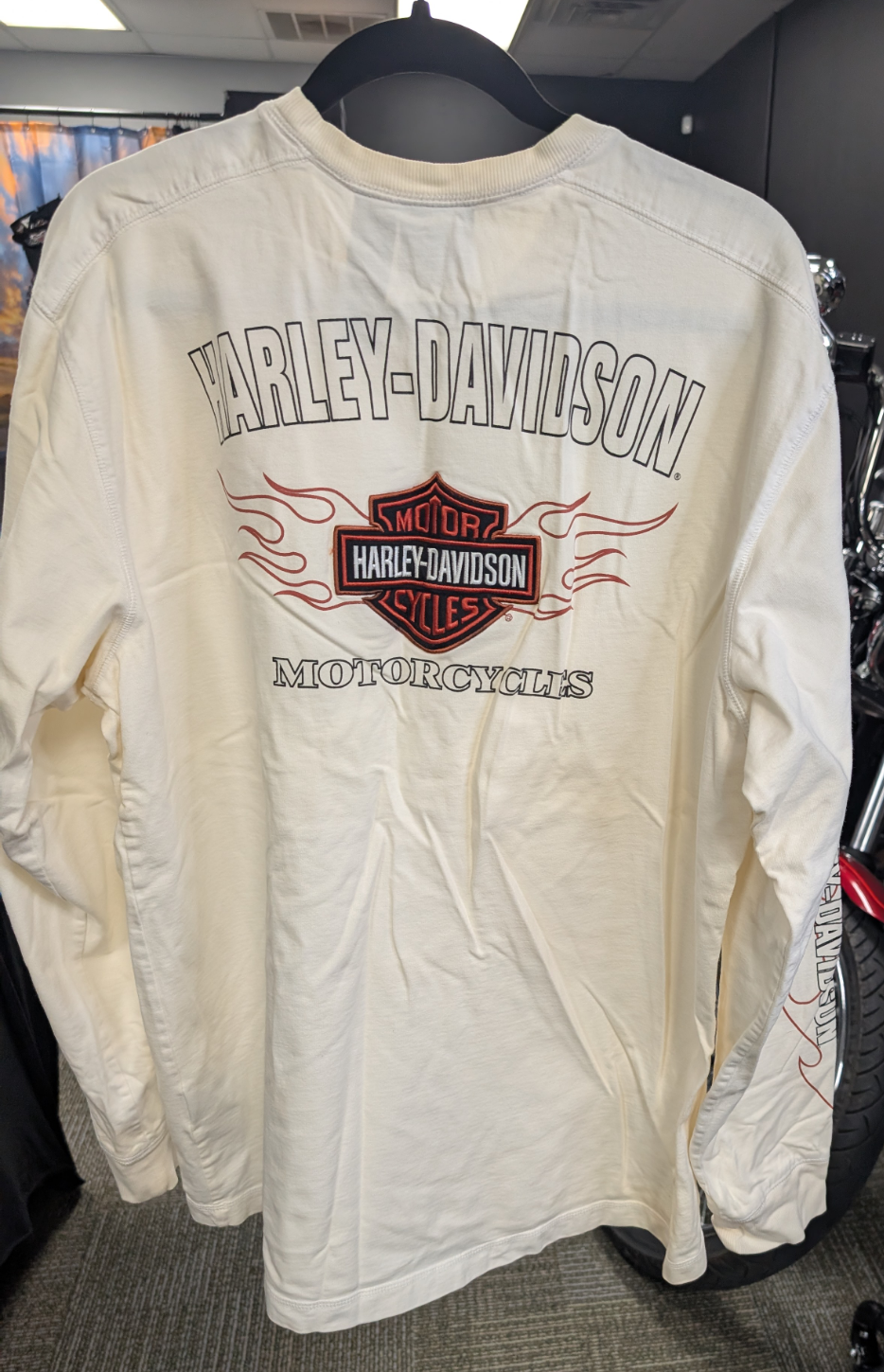Long sleeve Harley Davidson men's XL with flames on sleeve and patch logos