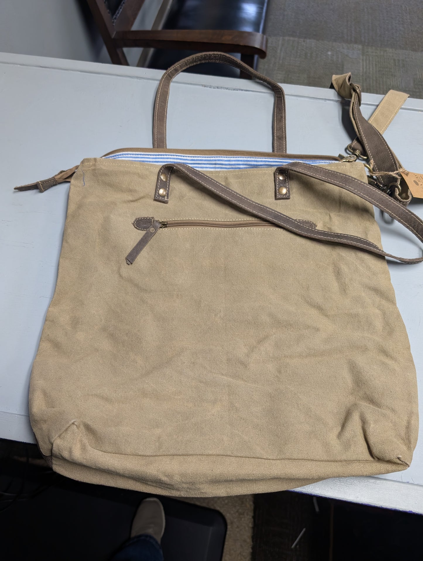 Tan canvas with floral pattern purse