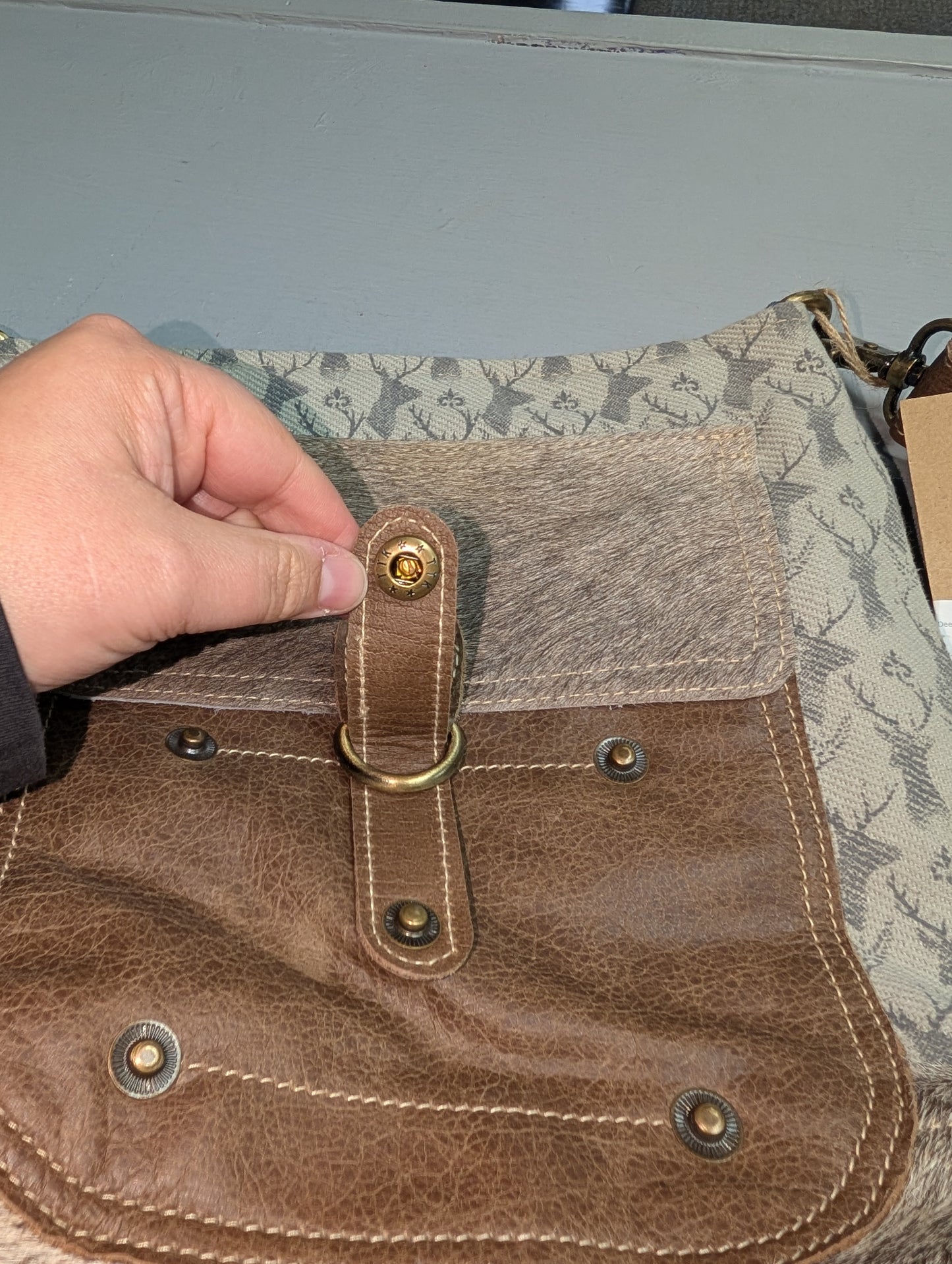 Deer print canvas shoulder bag with cowhide pocket