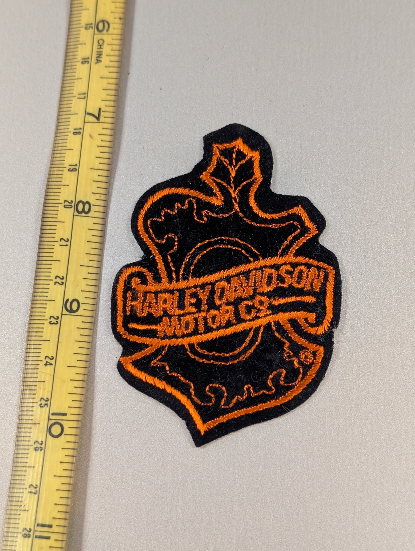 Vintage Harley-Davidson Ornate Shield Patch – Black & Orange