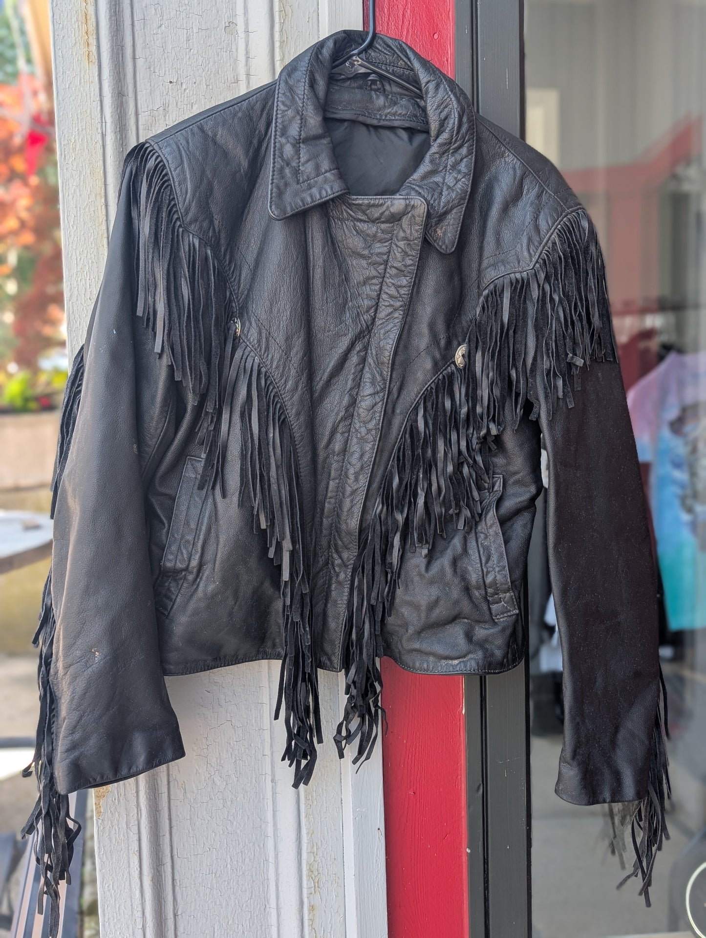 Black leather coat with fringes