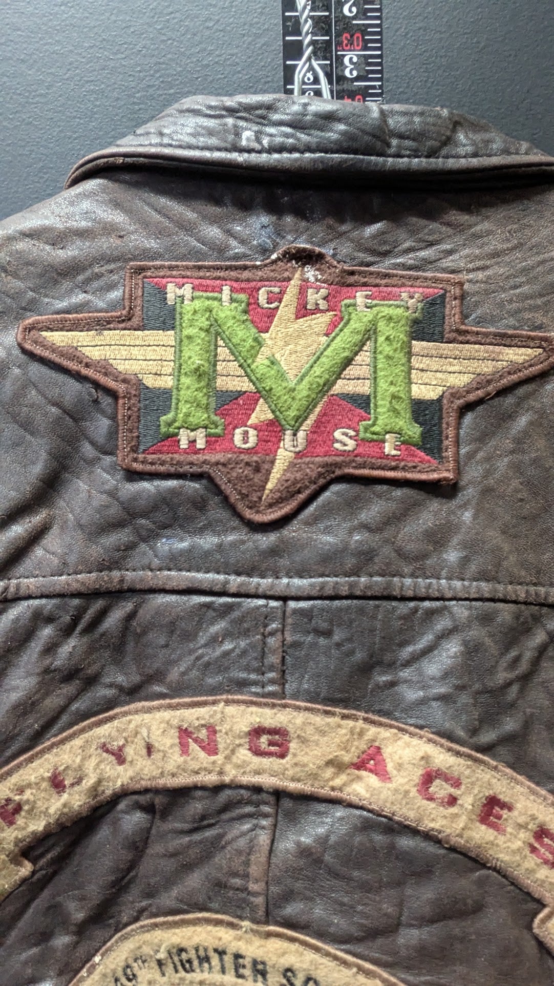 RARE VINTAGE 1994 DISNEY MICKEY MOUSE 449th FLYING ACES LEATHER JACKET - SIZE LARGE - THRASHED / AS-IS