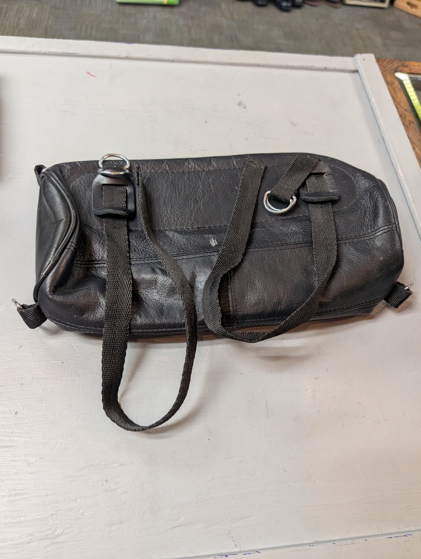 Strap on leather bag 12" x 5" x 3"