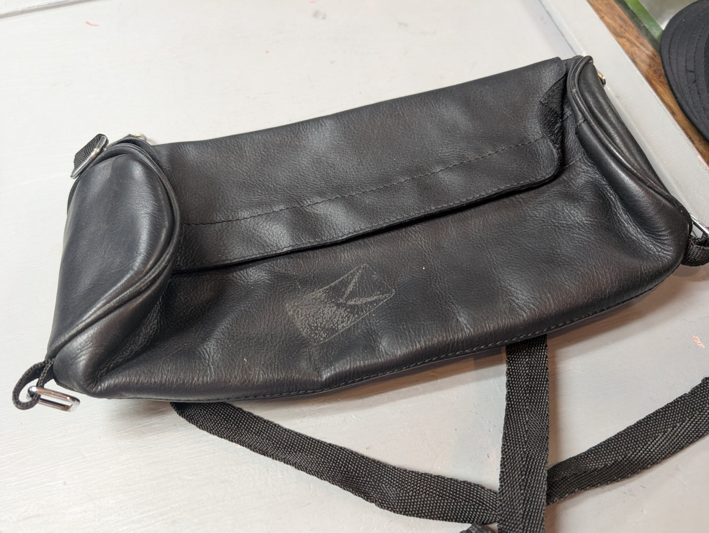 Strap on leather bag 12" x 5" x 3"